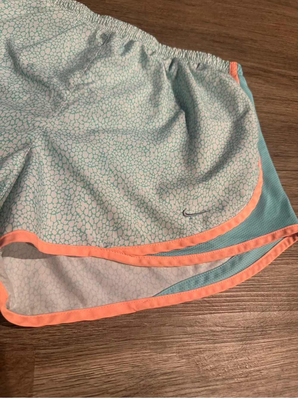 Nike Women's Light Teal Athletic Shorts with Coral Trim